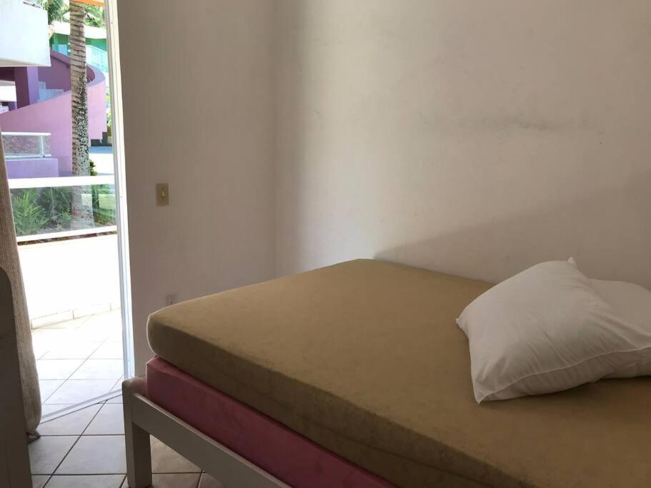 Apto em condomínio no centro de Bombinhas, próximo da praia