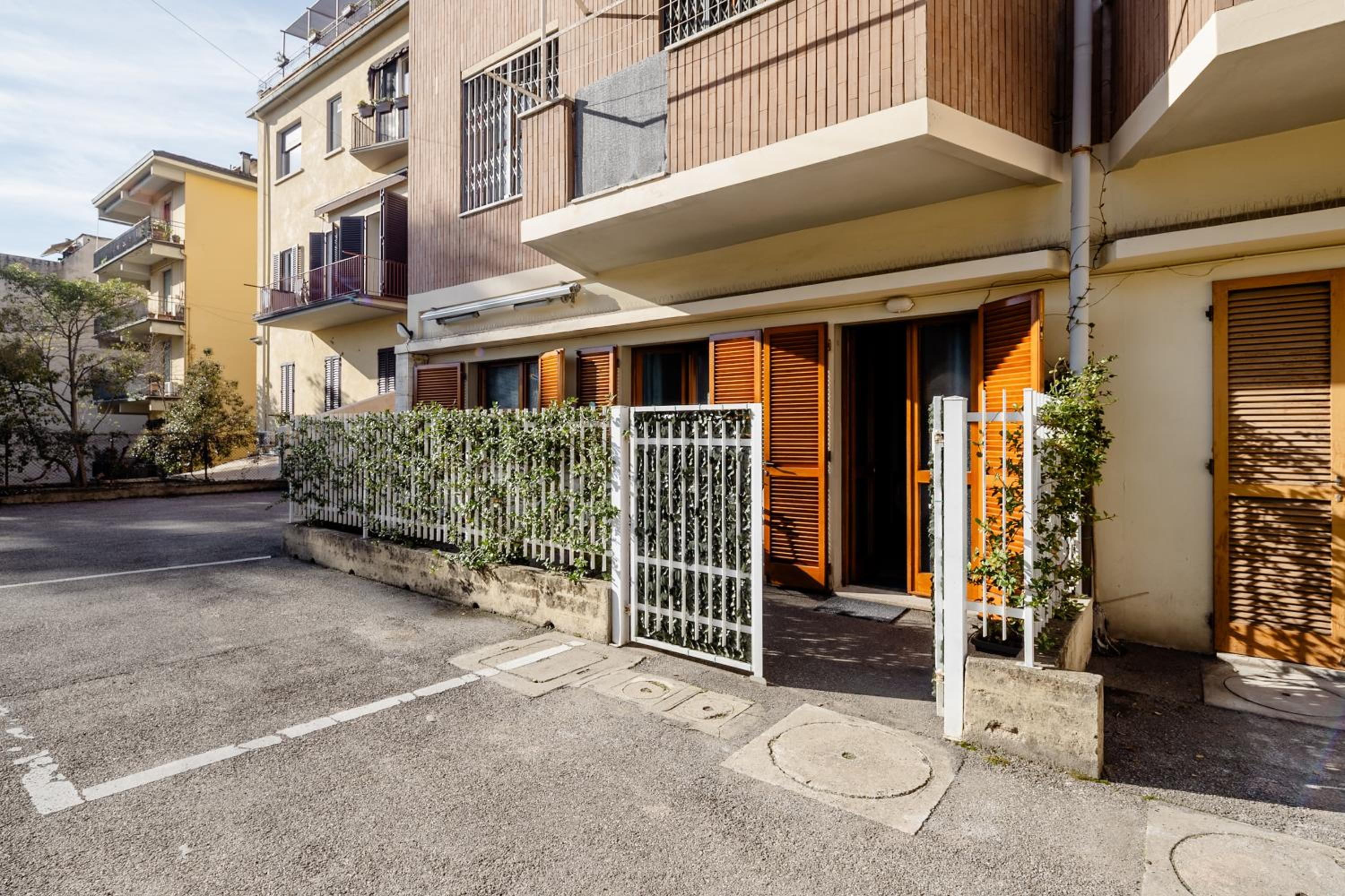 Open the Classic Wooden Shutters at a Cozy City Nest
