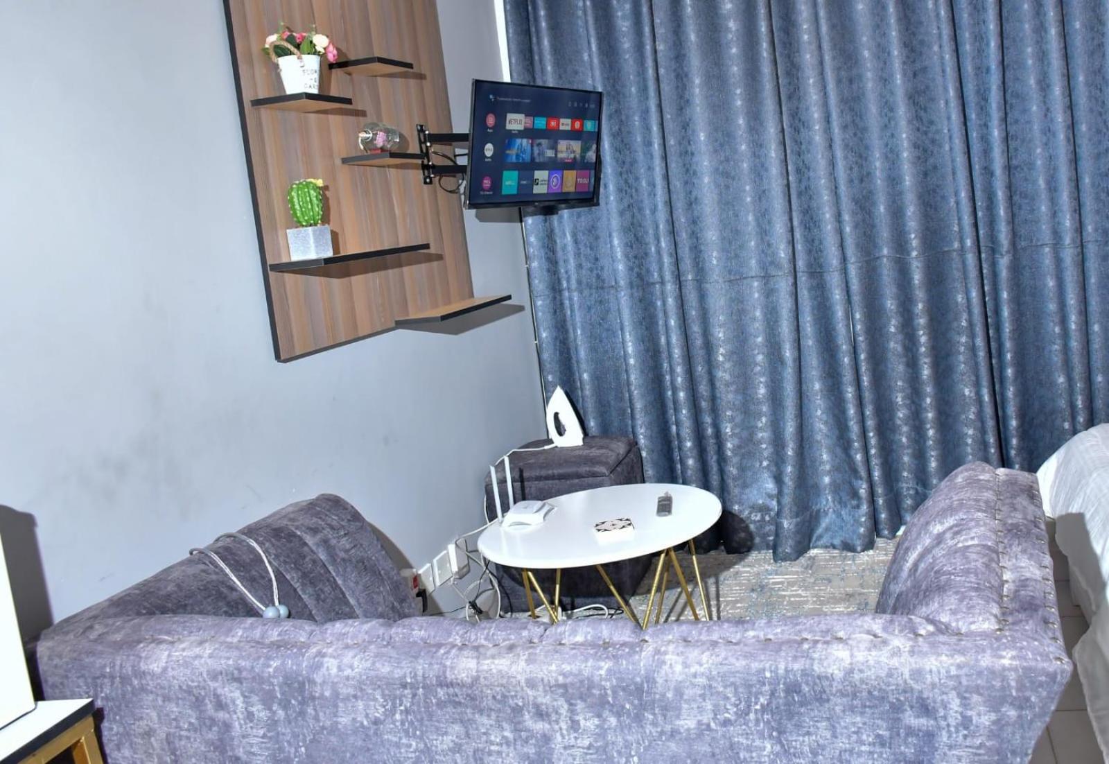 Grey studio with free parking and wifi view 3
