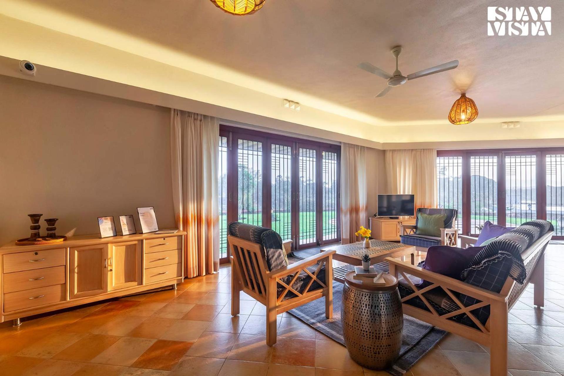 StayVista's Waterway Retreat - Lakeside Oasis with Infinity Pool