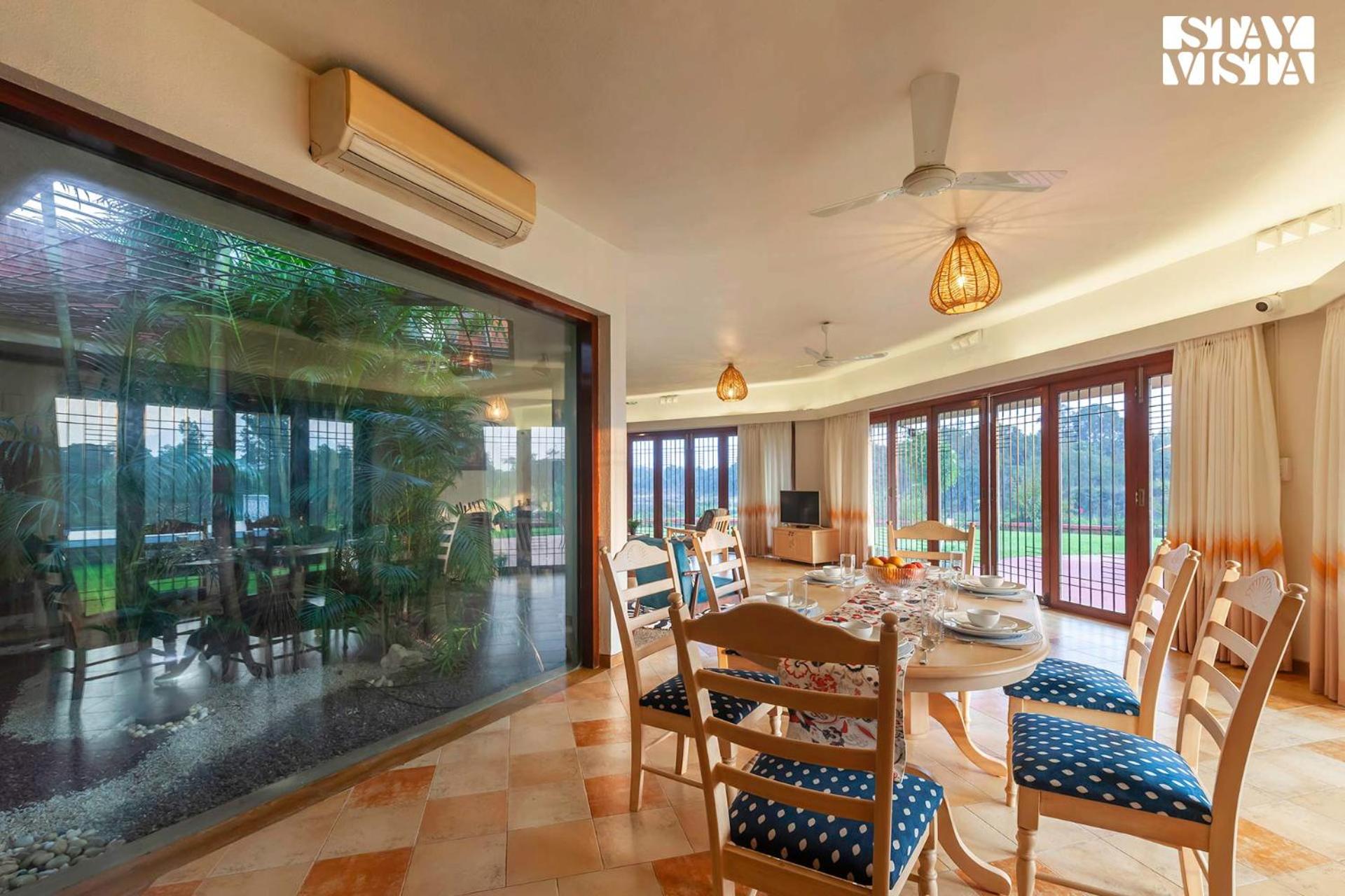 StayVista's Waterway Retreat - Lakeside Oasis with Infinity Pool