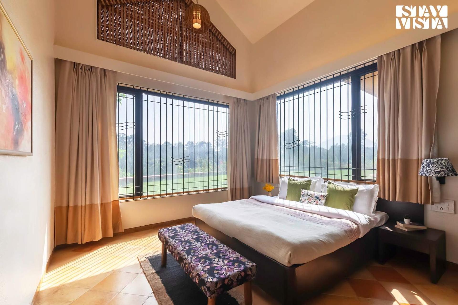StayVista's Waterway Retreat - Lakeside Oasis with Infinity Pool