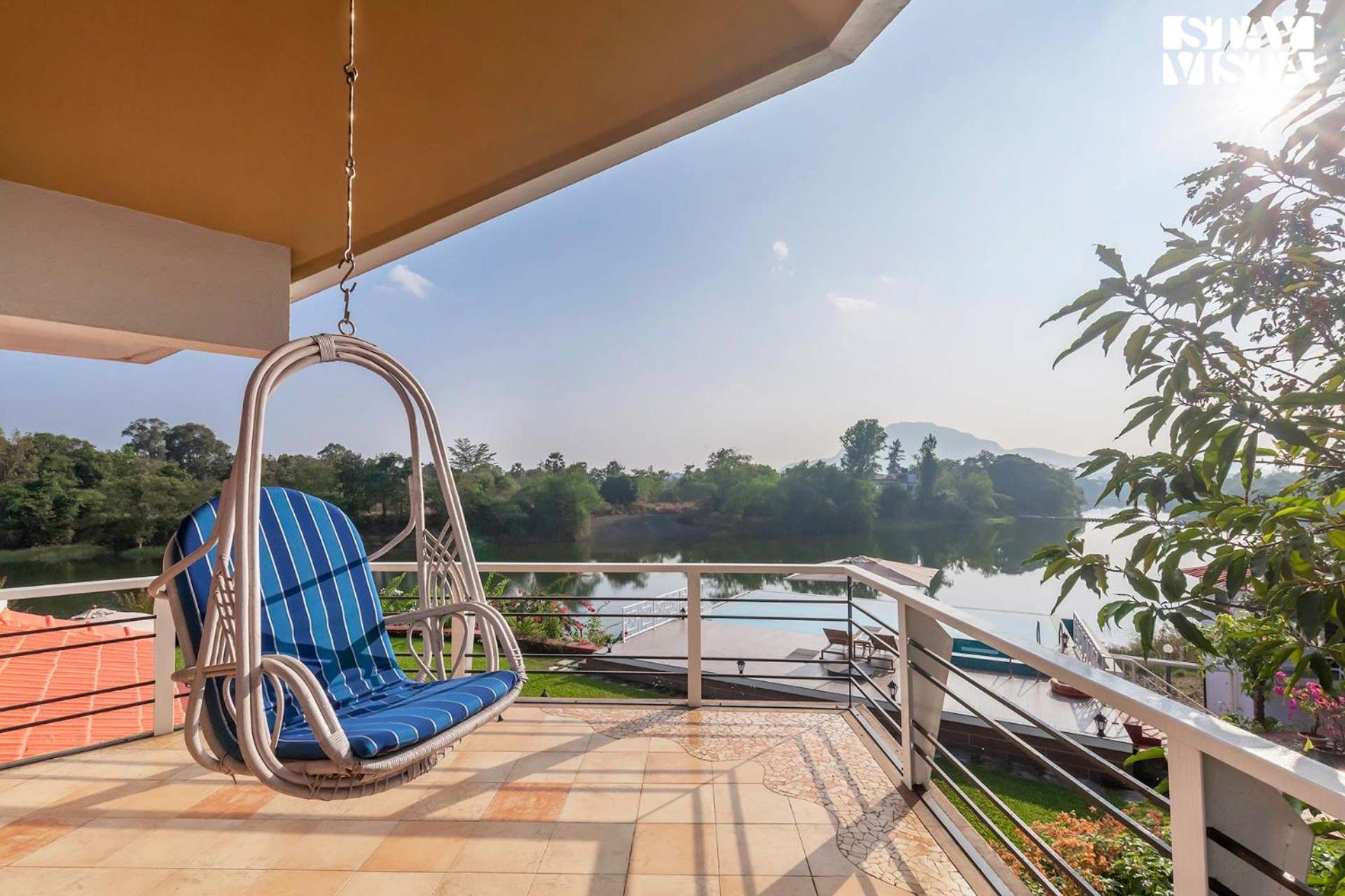 StayVista's Waterway Retreat - Lakeside Oasis with Infinity Pool