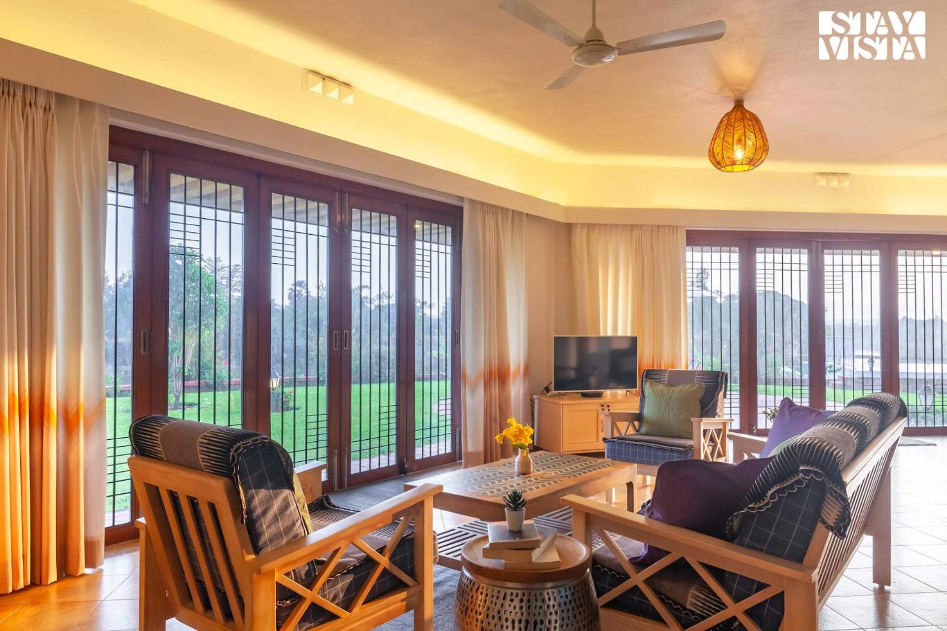 StayVista's Waterway Retreat - Lakeside Oasis with Infinity Pool