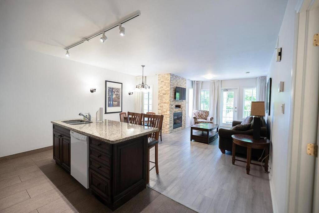 Relax & Rejuvenate at 2BR Retreat with Pool & Gym