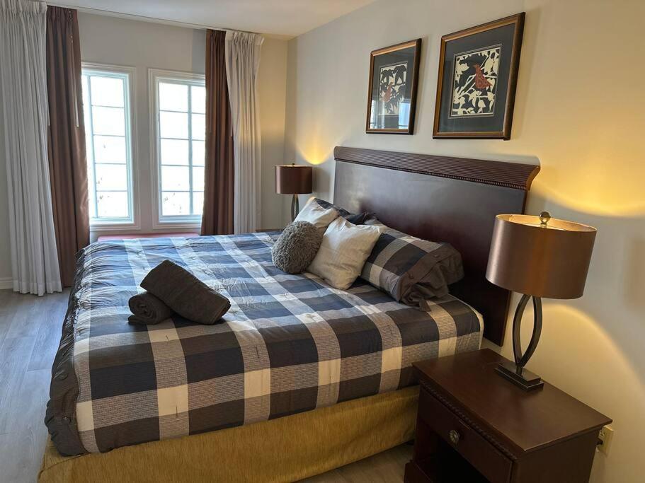 Relax & Rejuvenate at 2BR Retreat with Pool & Gym