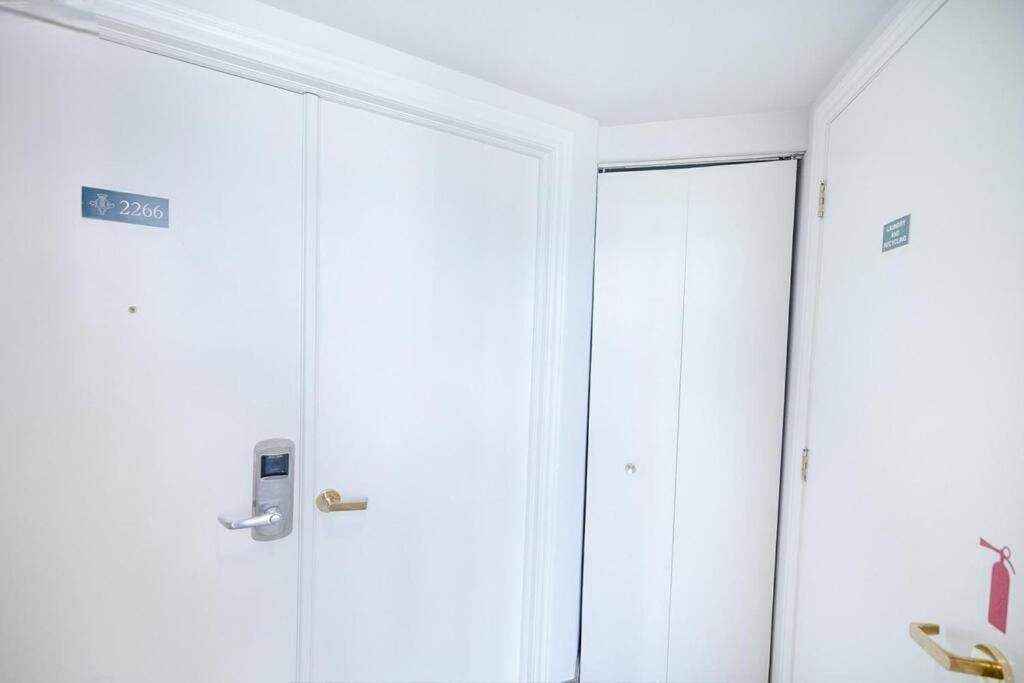 Relax & Rejuvenate at 2BR Retreat with Pool & Gym