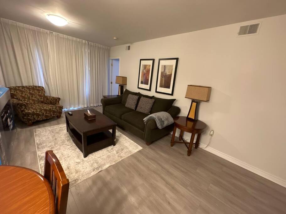 Relax & Rejuvenate at 2BR Retreat with Pool & Gym