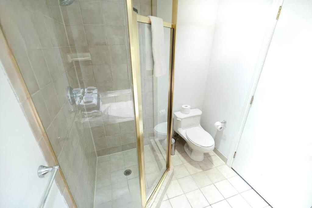 Relax & Rejuvenate at 2BR Retreat with Pool & Gym