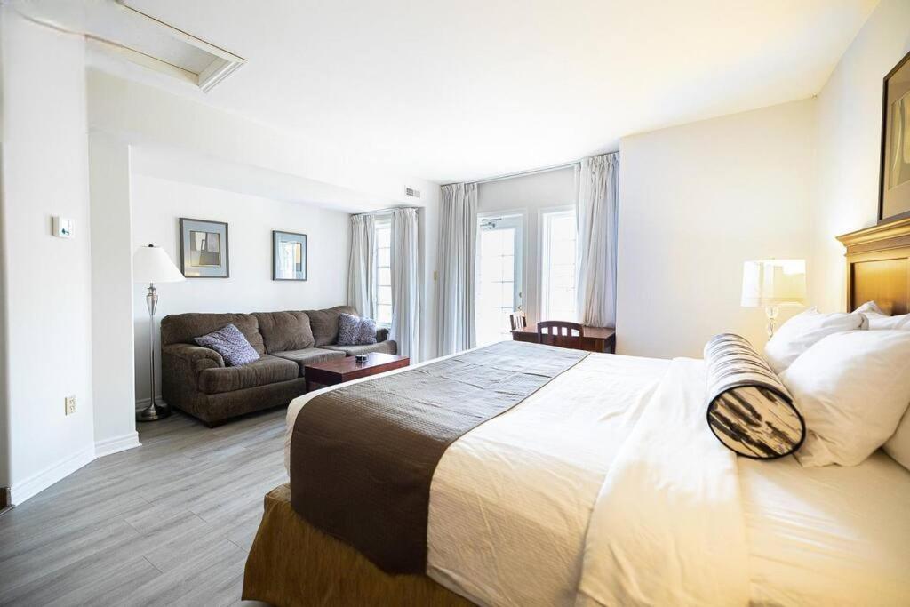 Relax & Rejuvenate at 2BR Retreat with Pool & Gym