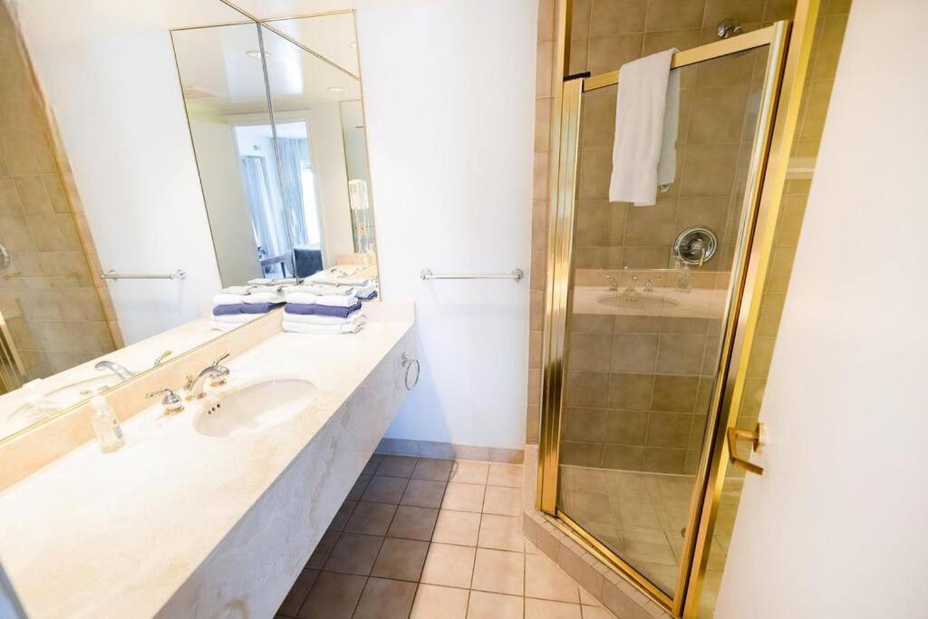 Relax & Rejuvenate at 2BR Retreat with Pool & Gym
