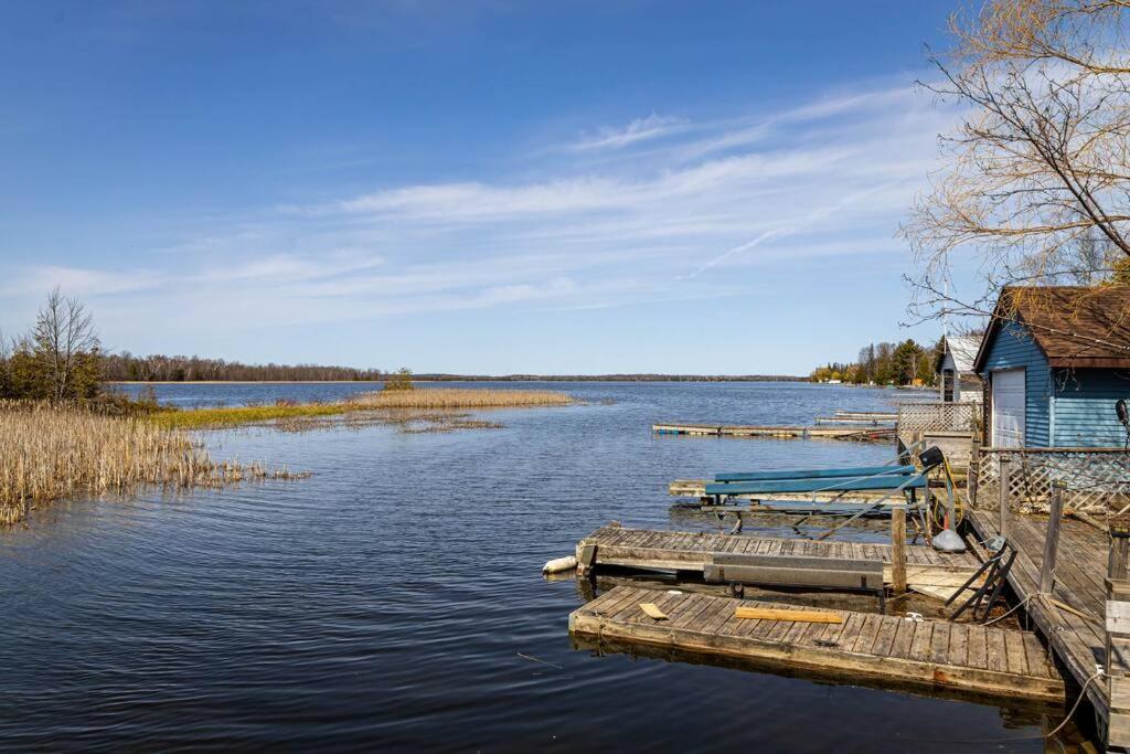 Waterfront Cottage with Sunsets, BBQ and Yard