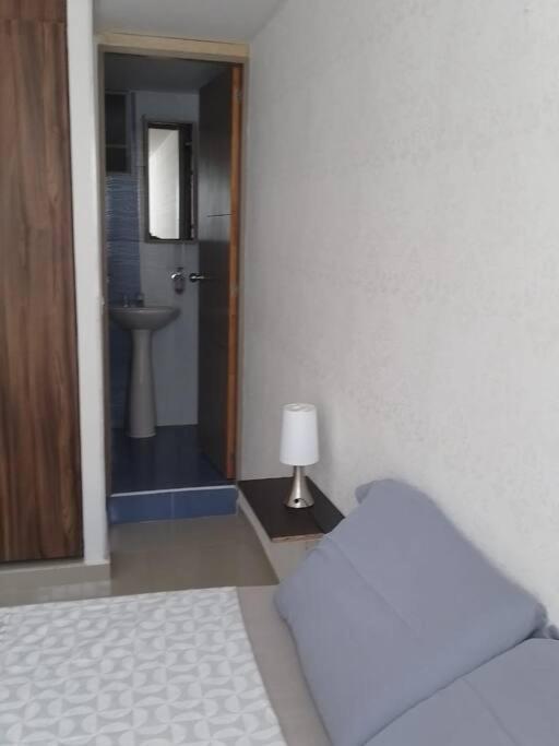Precioso apto con un aire acondicionado en la Sala