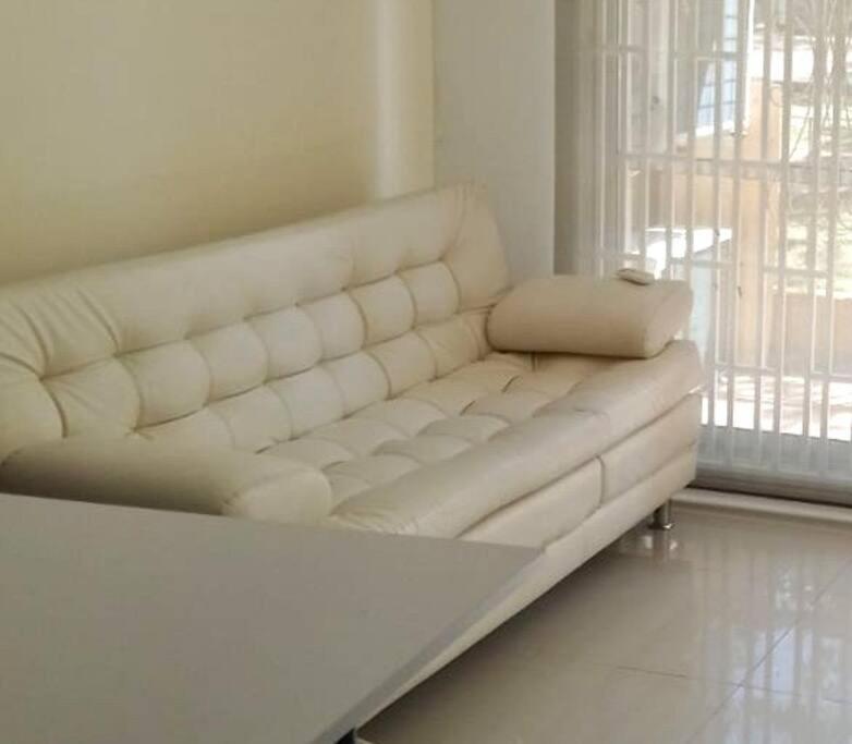 Precioso apto con un aire acondicionado en la Sala