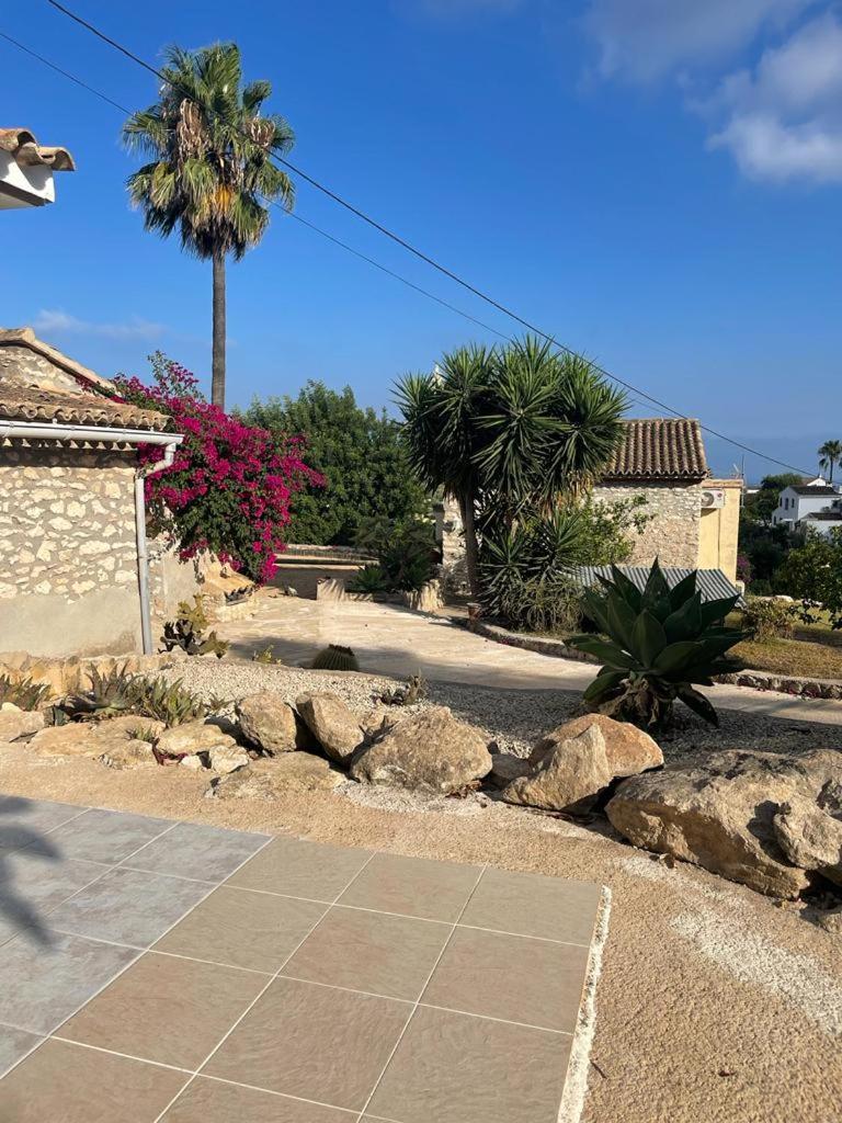 Rustico Appartment 'Olta' in finca, see-and garden side view 5