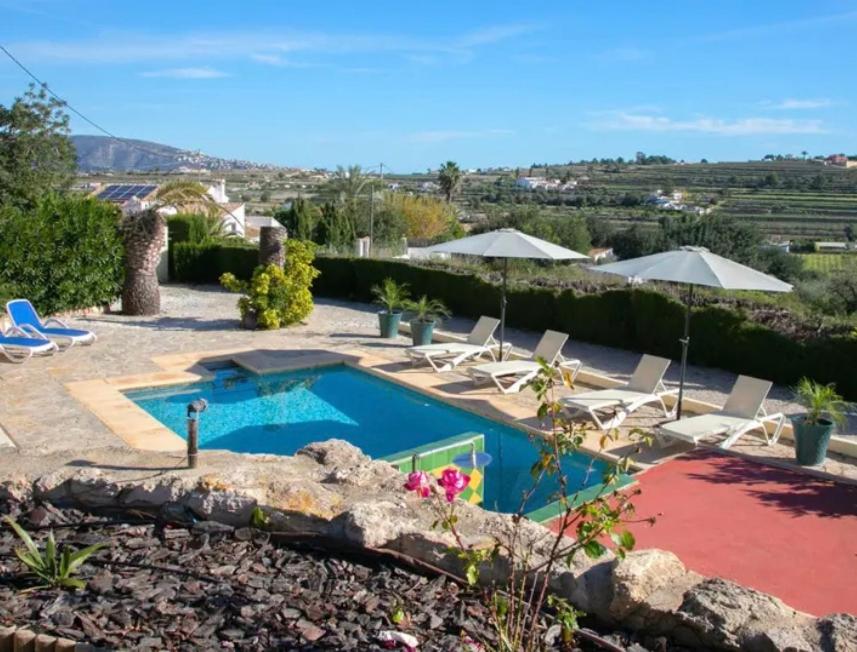 Rustico Appartment 'Olta' in finca, see-and garden side view 3