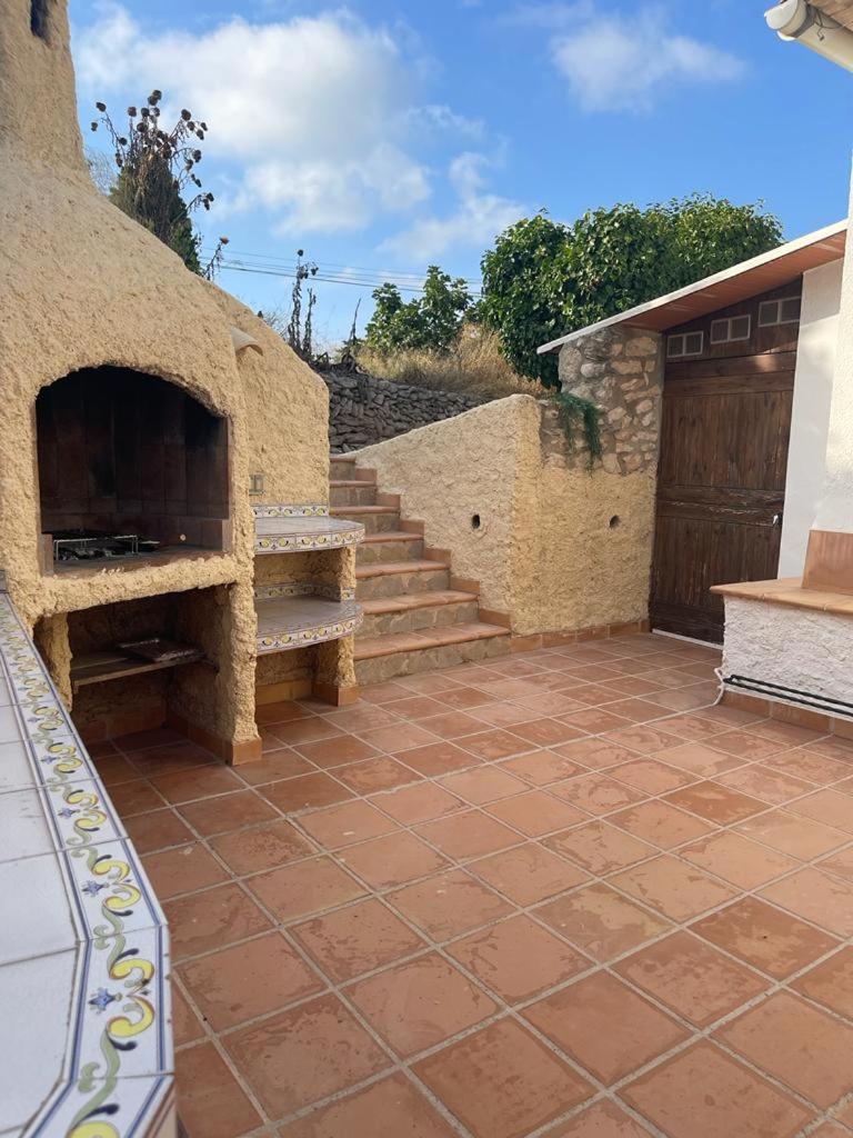 Rustico Appartment 'Olta' in finca, see-and garden side view 2