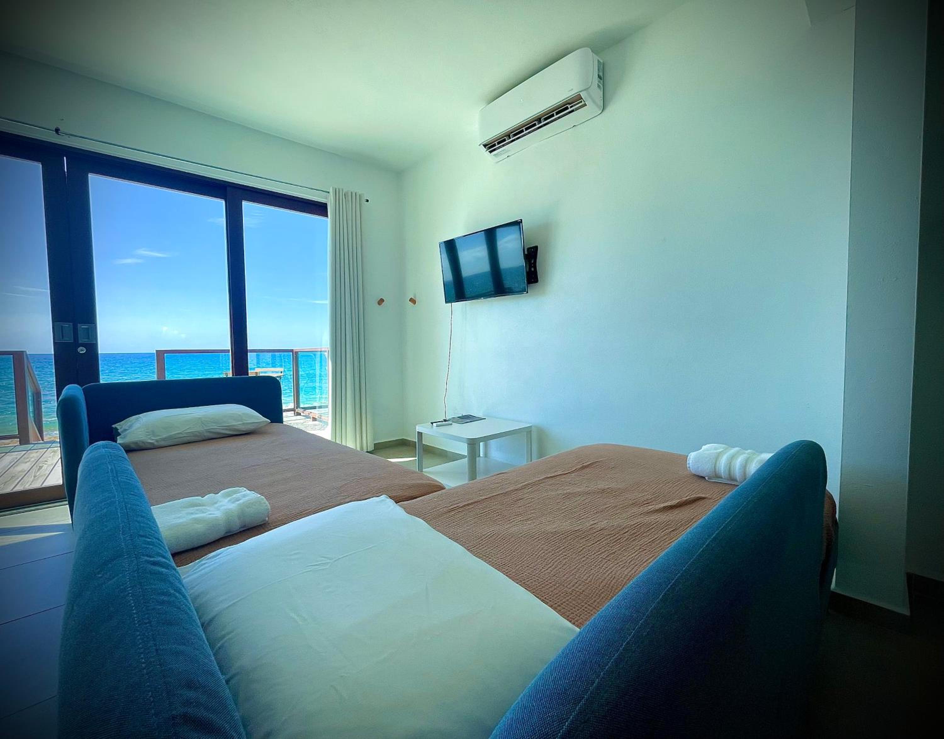 1 Corcega Beachfront Suites view 3