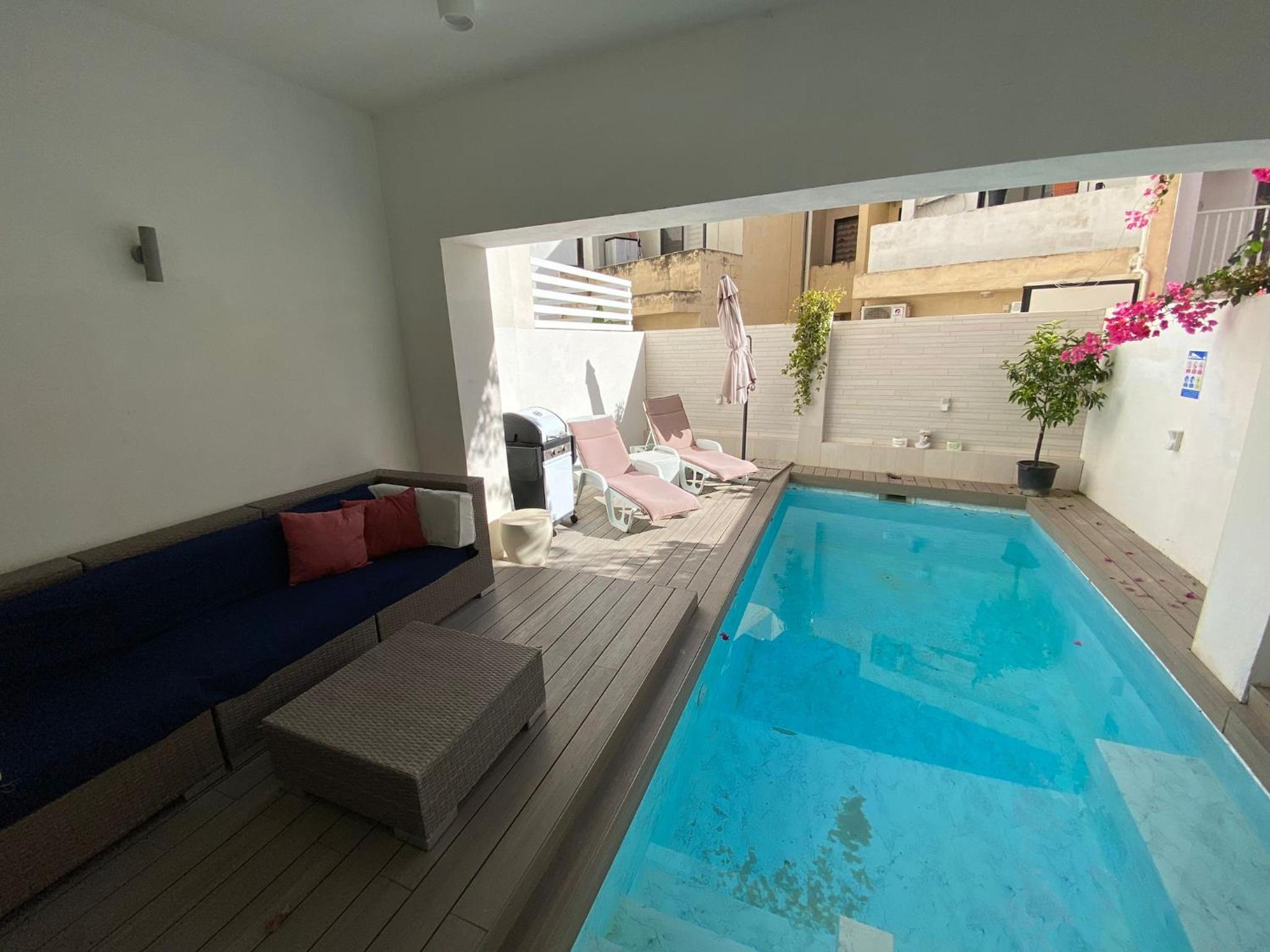 St Julians Apt with Pool photo 5