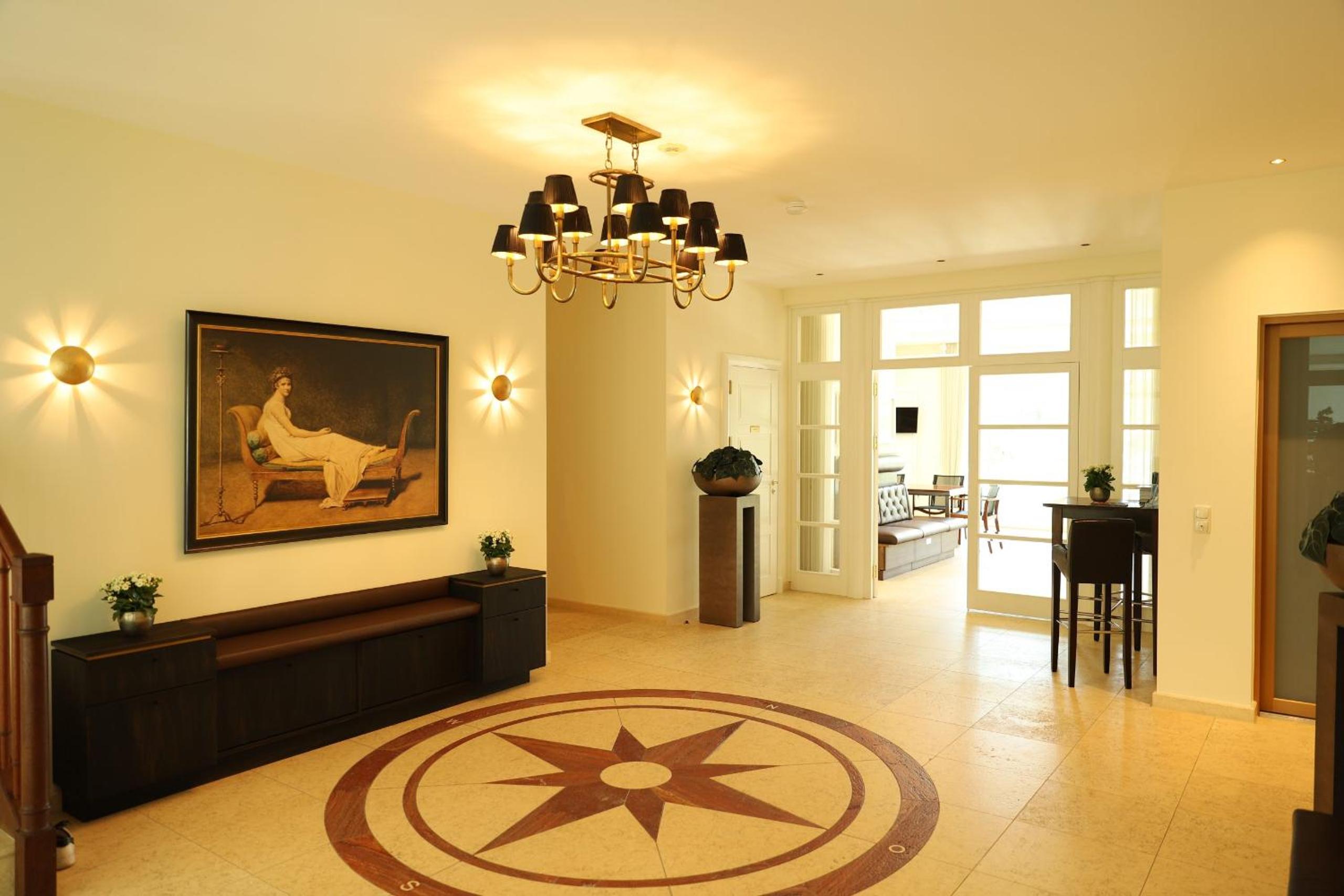 Villa Schmidt Apartments - Strandhaus direkt am Meer mit Sauna, Sport und Dünengarten - Komfort