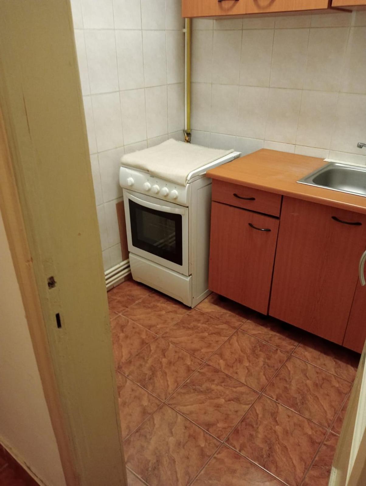 Romana City Center Studio en Bucharest — kitchen