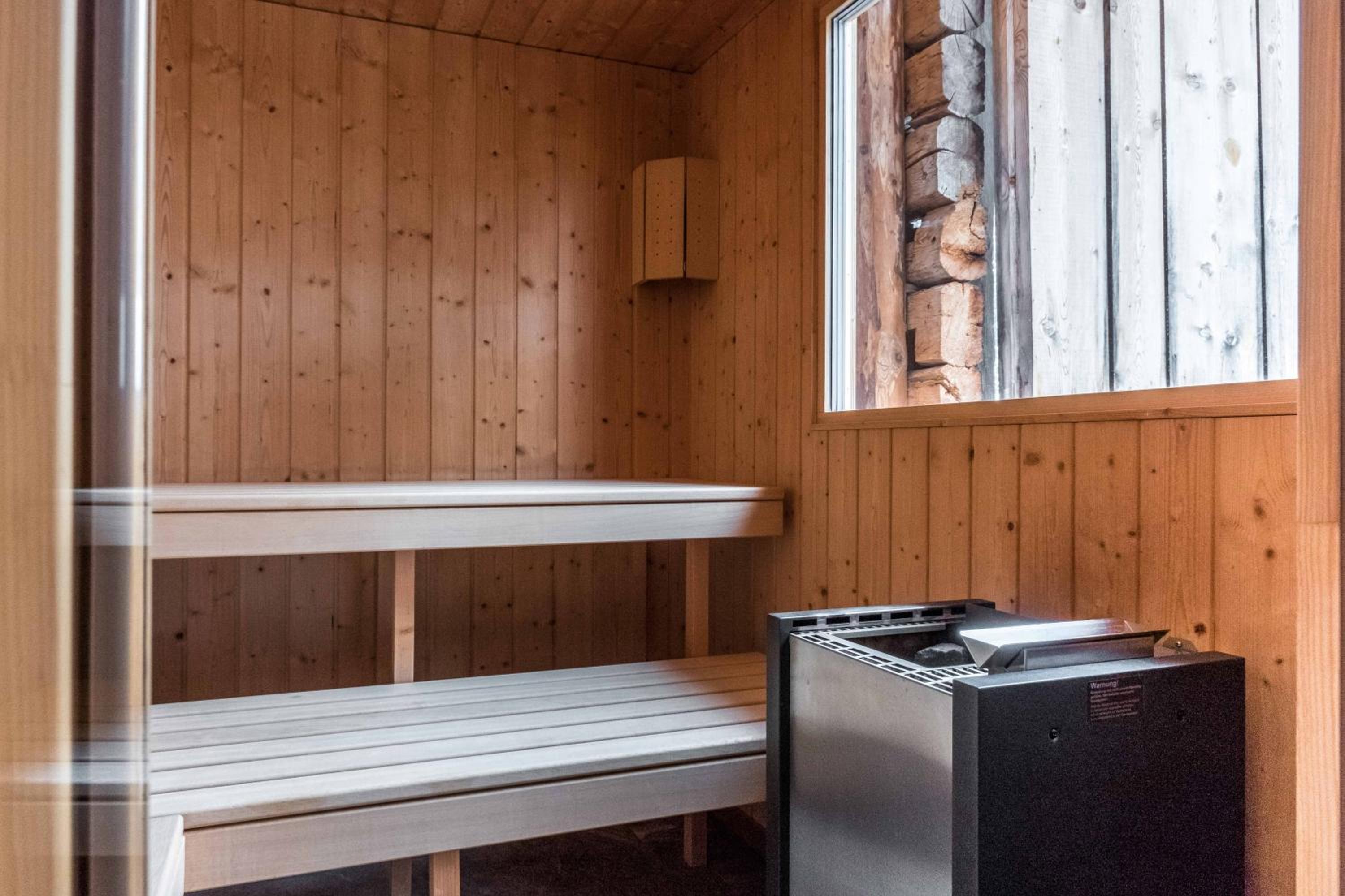 Eigerhome - The Cottage mit Wellness - GRIWA RENT AG