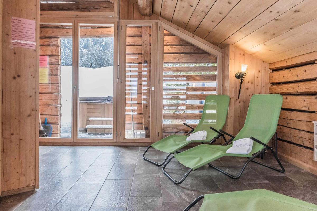 Eigerhome - The Cottage mit Wellness - GRIWA RENT AG