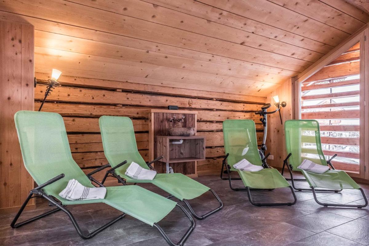 Eigerhome - The Cottage mit Wellness - GRIWA RENT AG