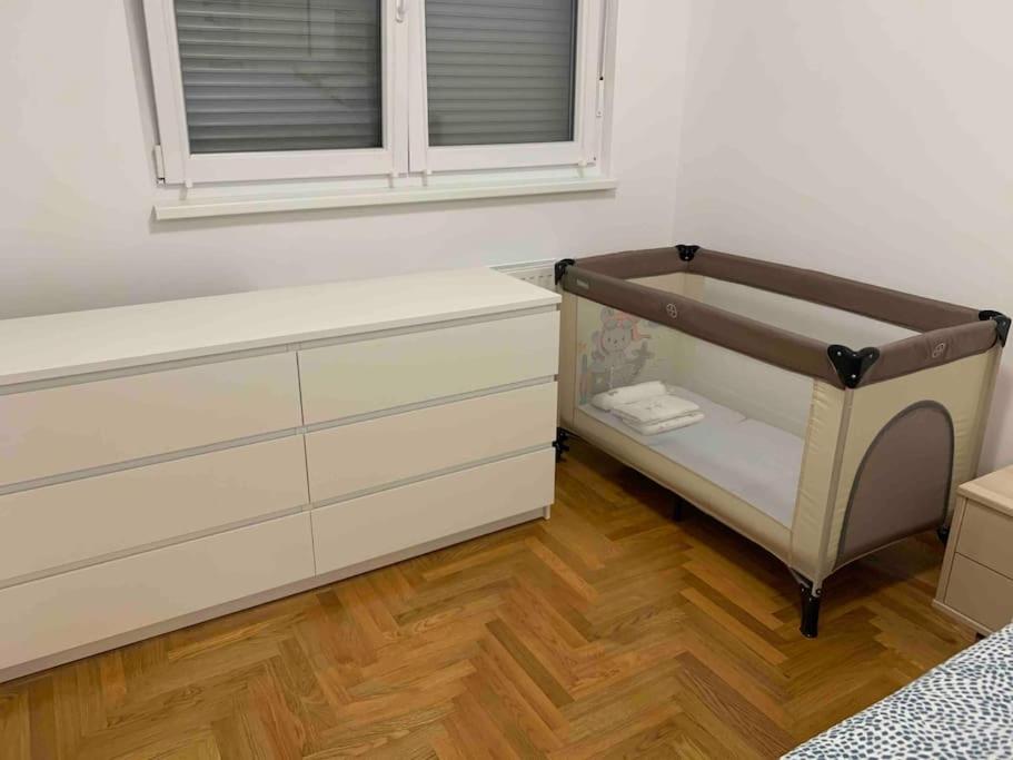 Close to center big terrace city tram garage parking place fast WIFI Super king size bed grocery 1min view 2