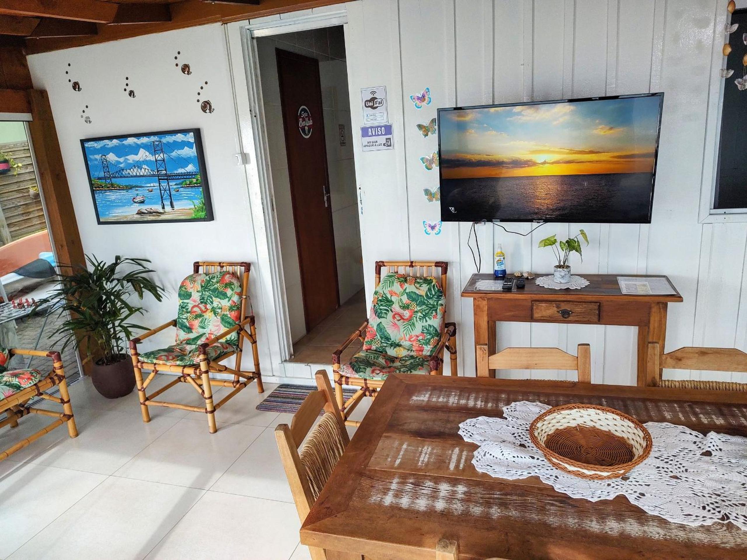 Casa charmosa pé na areia por do sol