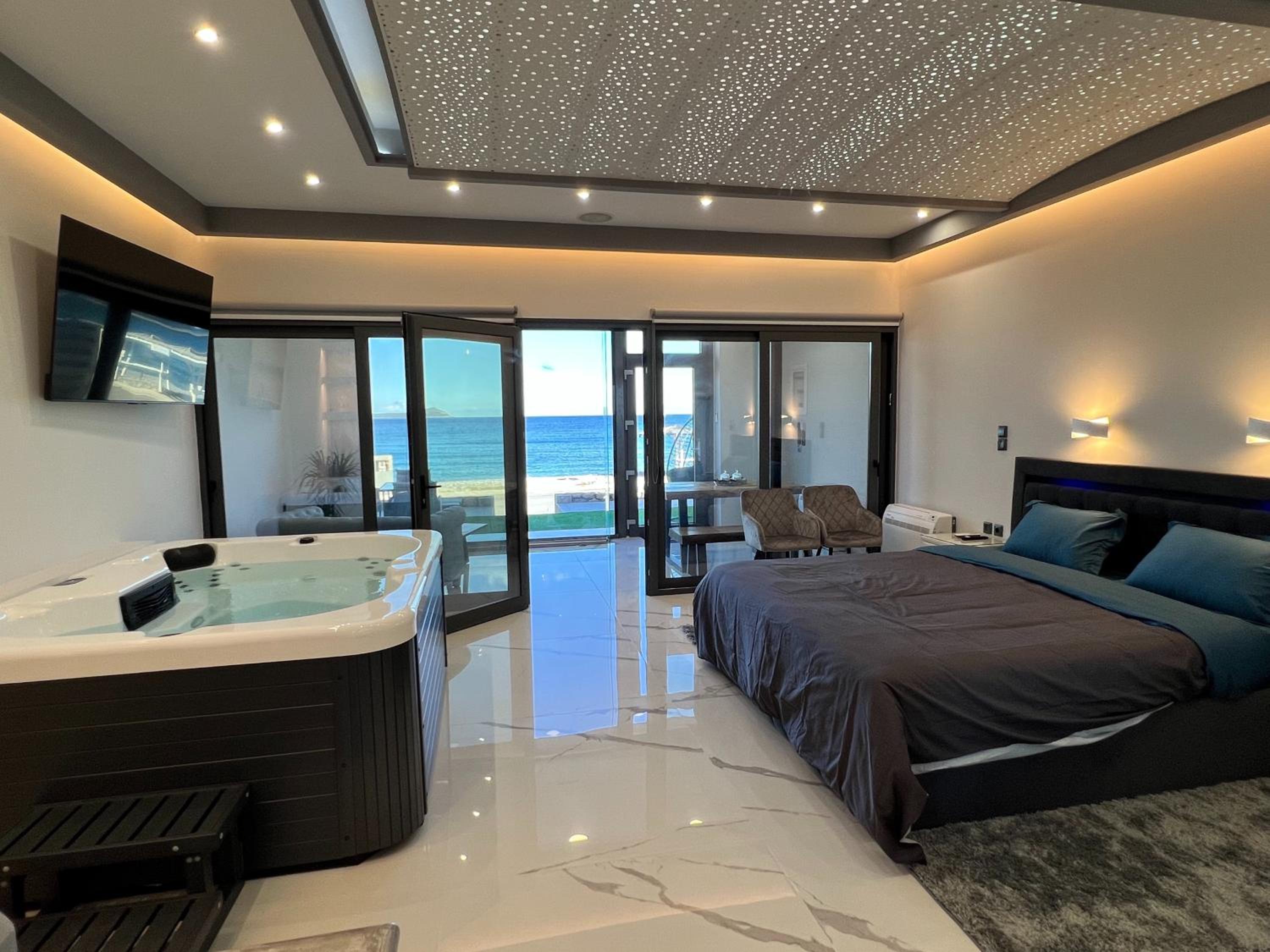 Seafront Luxury Suite with Jacuzzi & Sauna view 5