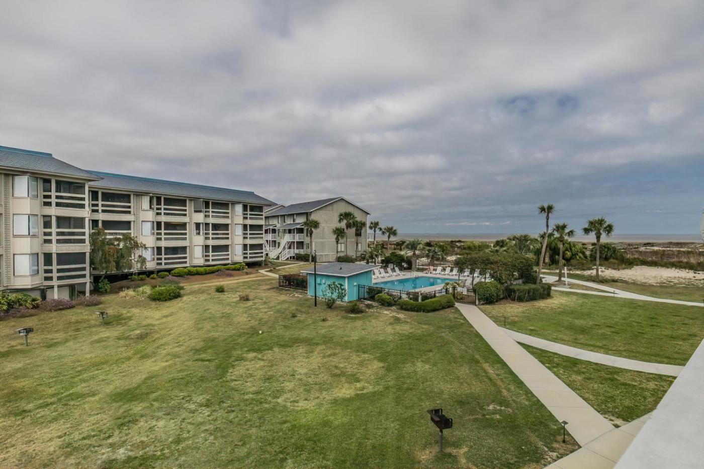 New Listing - Overlooking the Pool with Beach Views
