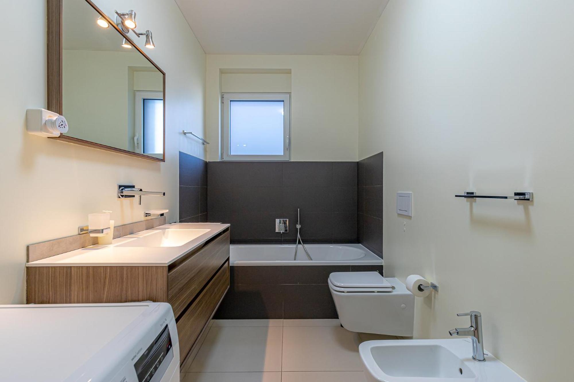 IMPERIAL of LUGANO 3 with a lake view behind the station and 10 min from the lake of Lugano