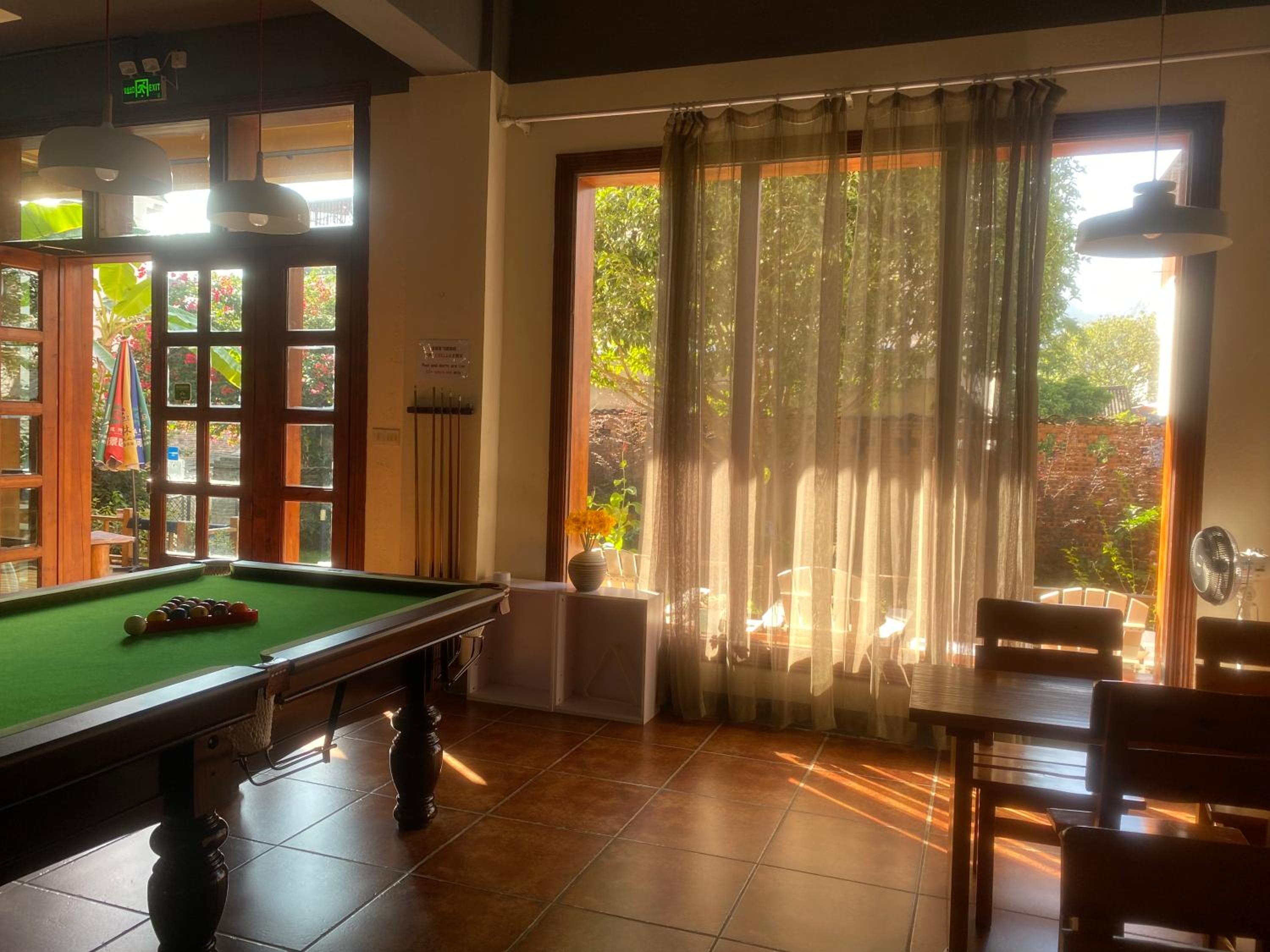 Yangshuo Eden's Social Guesthouse - Wake up to a hearty Western breakfast & fresh craft coffee & night beers & outdoor activities