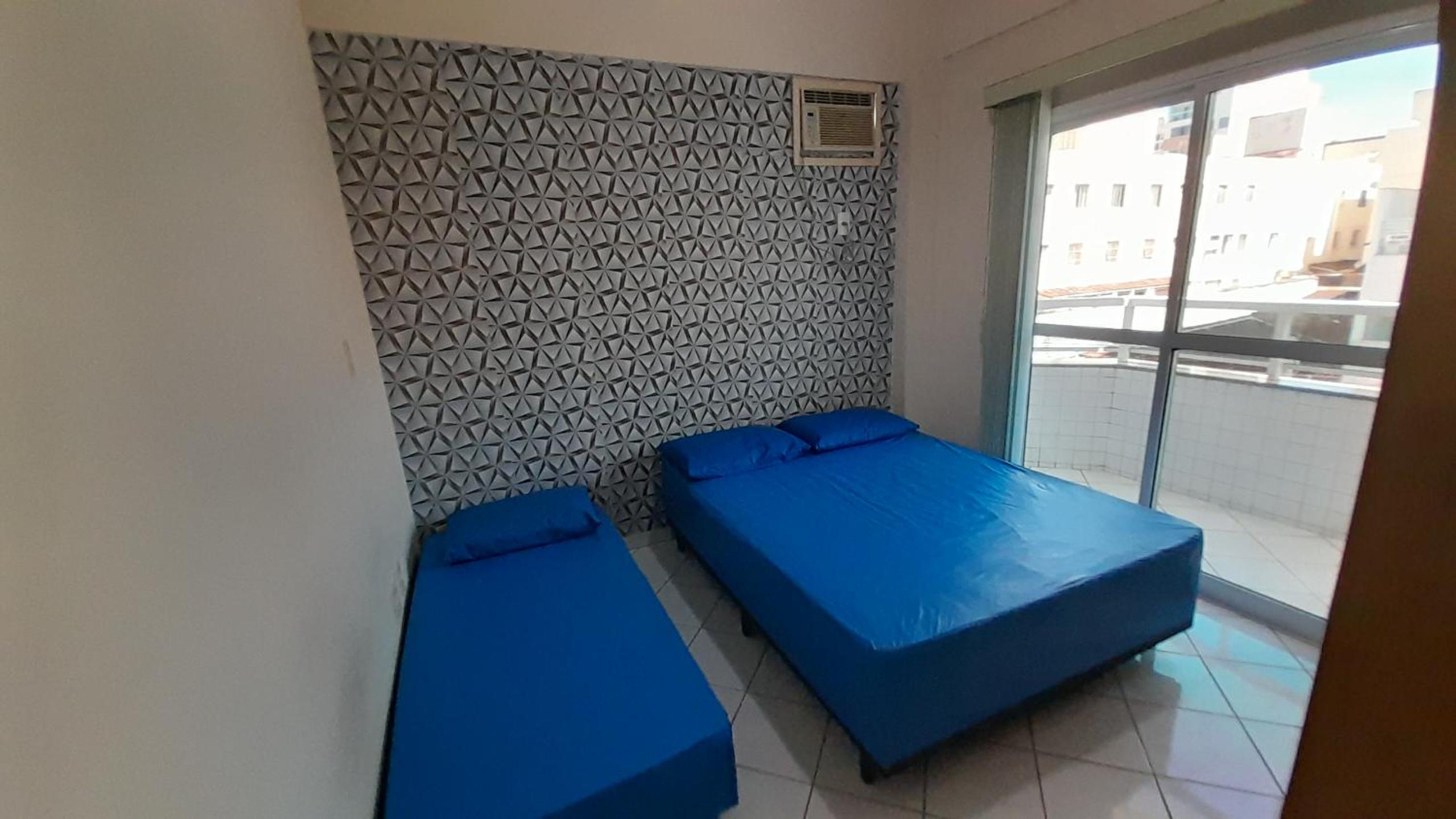 Lindo apartamento com Wi-Fi a 370m da Praia do Morro, próximo ao Marlim Azul e à Av Paris