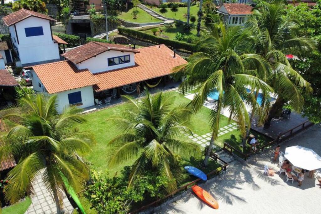 Pé na areia e tranquilidade
