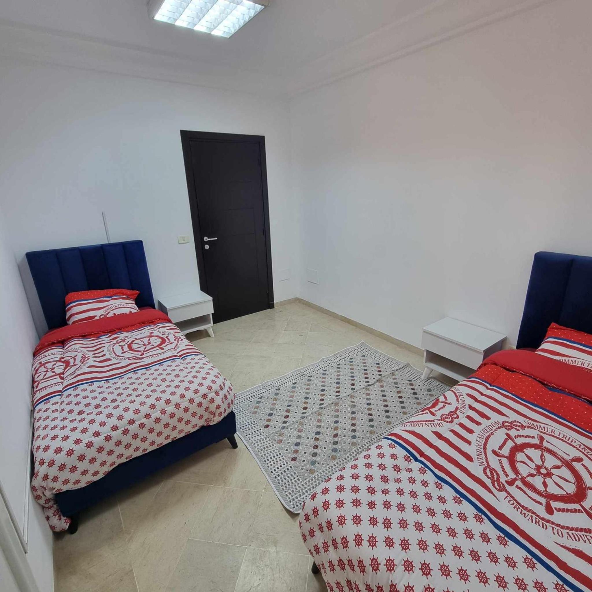 Spacious Apartment Ennasr 2 view 2