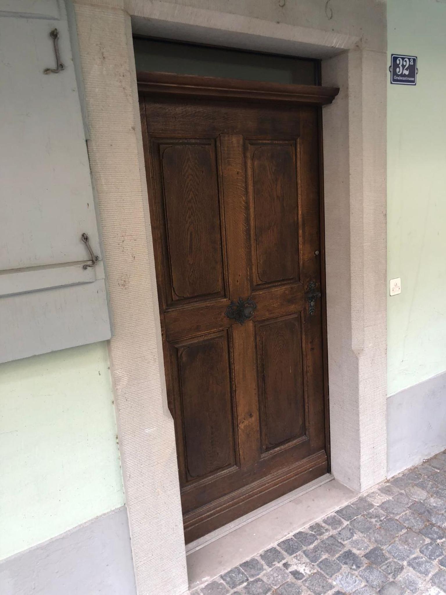 Bedroom cum office with shared shower in Zug's Old Town