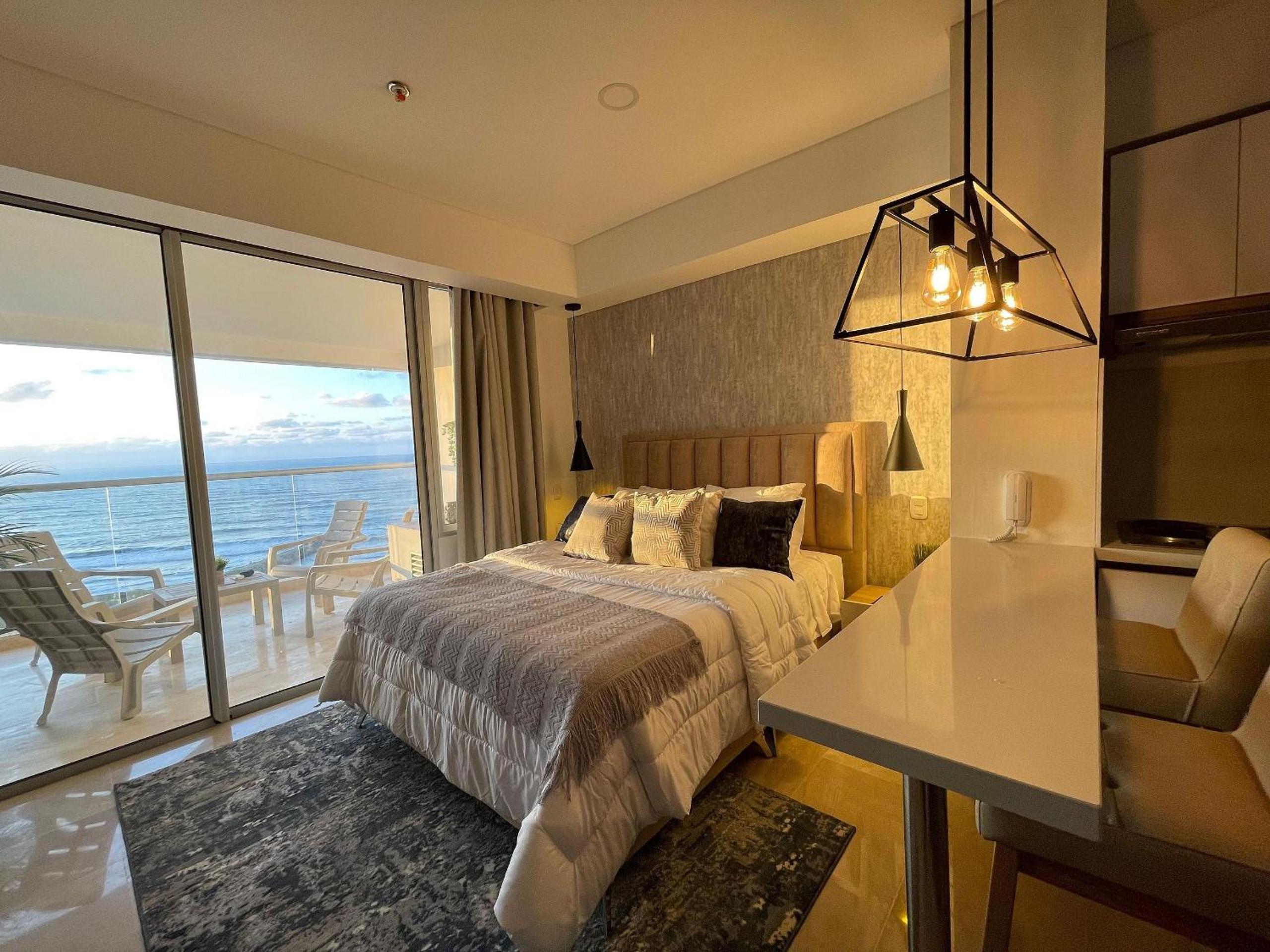 New exclusive beachfront condo