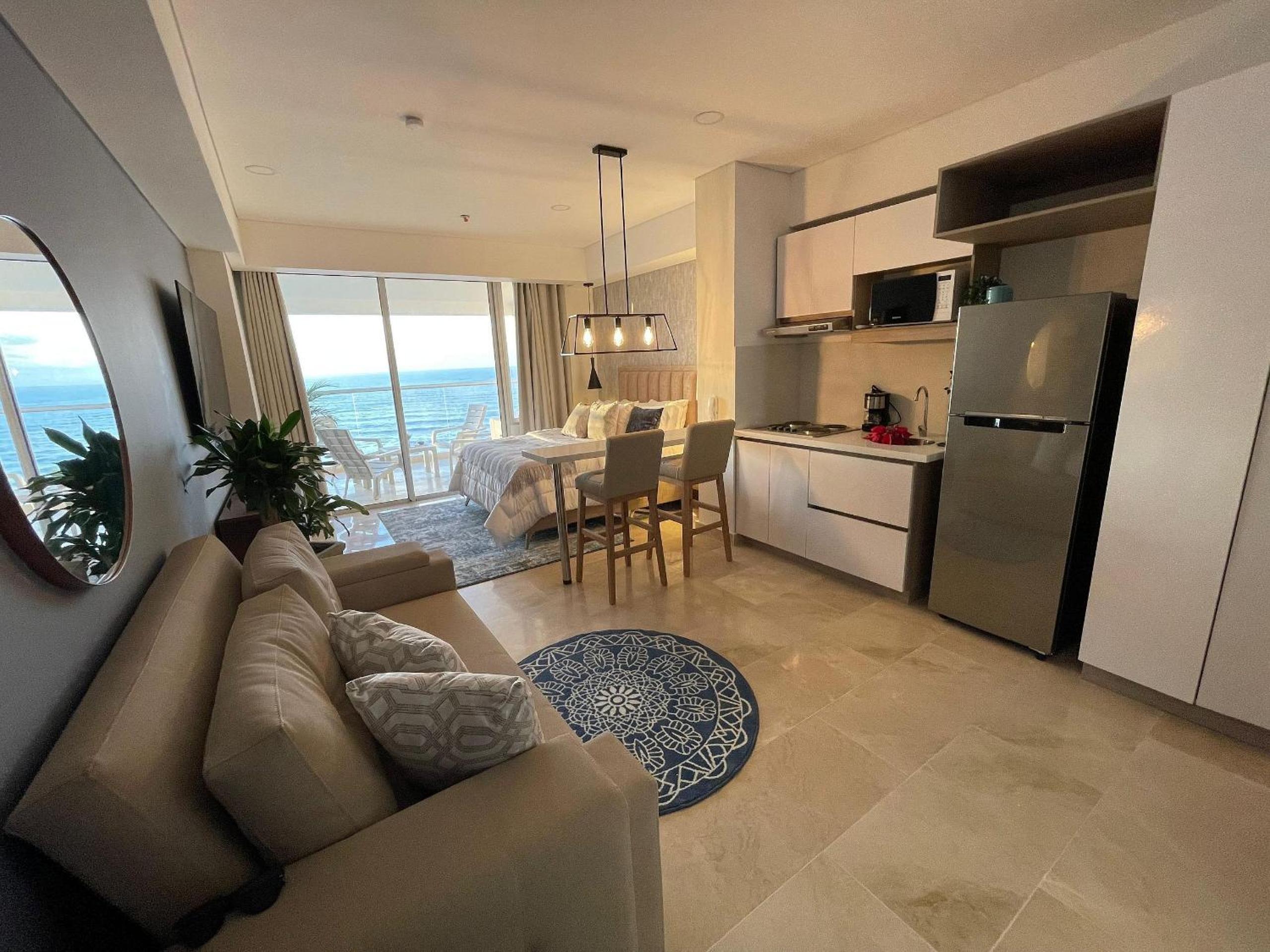 New exclusive beachfront condo
