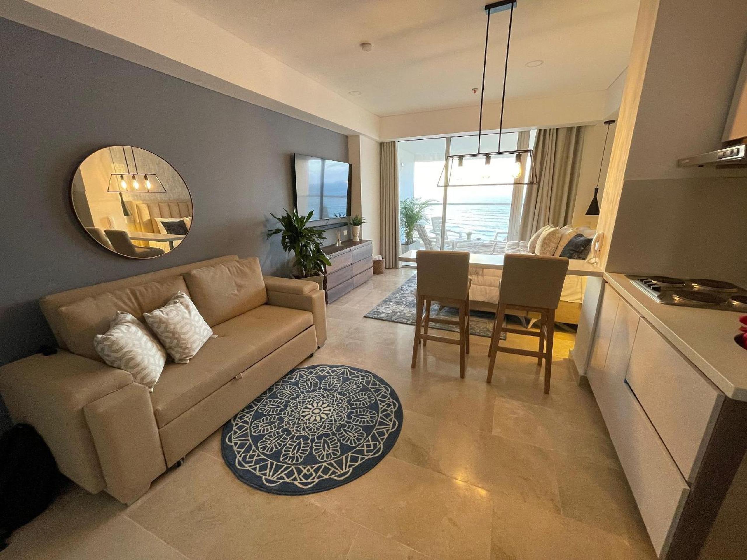 New exclusive beachfront condo