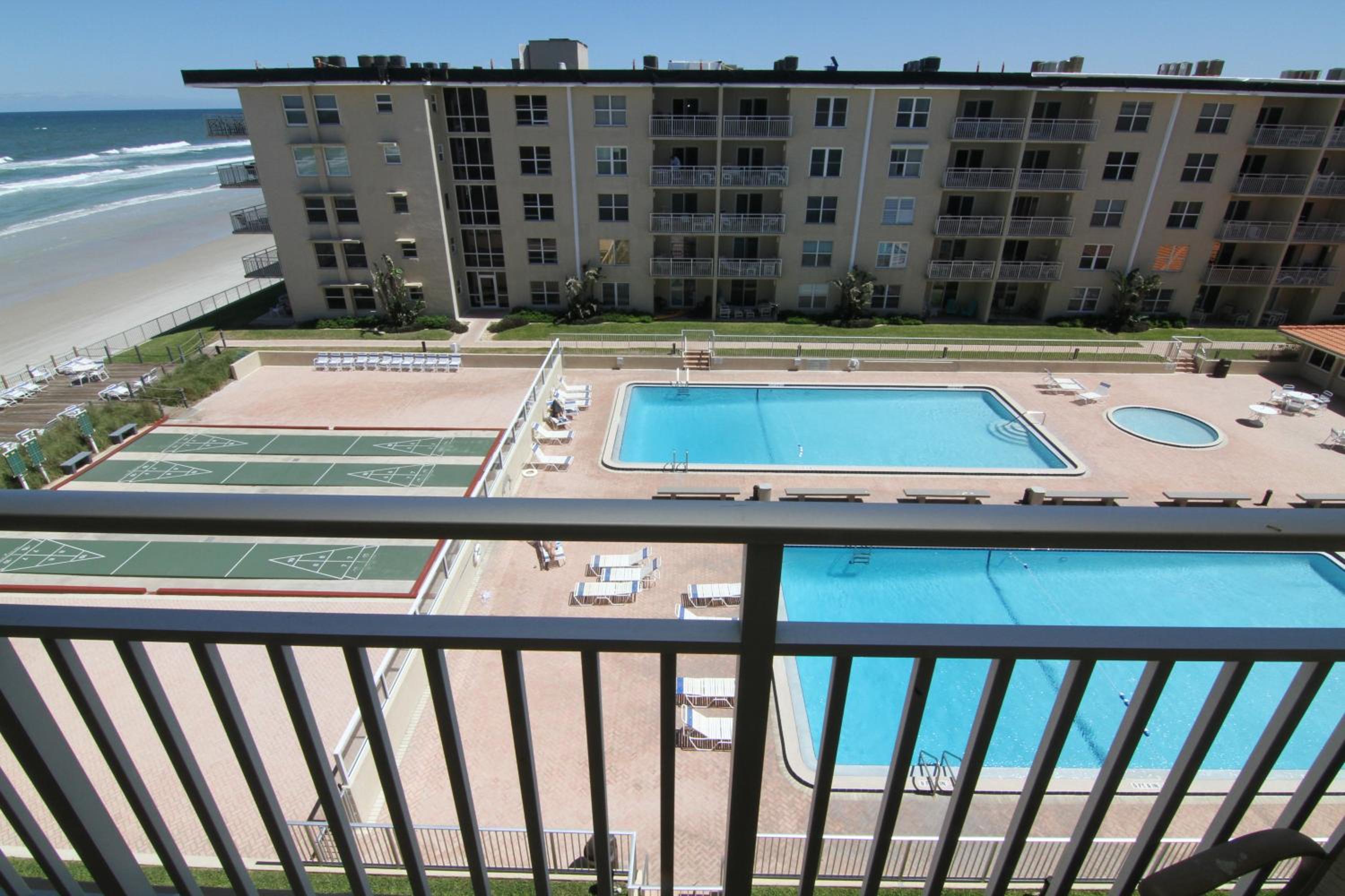 Visit this top floor property located on the no-drive beach with 2 complex pools! view 3