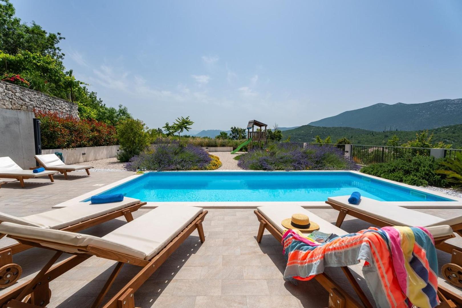 Villa Belina: 4 ensuite bedrooms, game room, heated pool, sauna & gym view 3