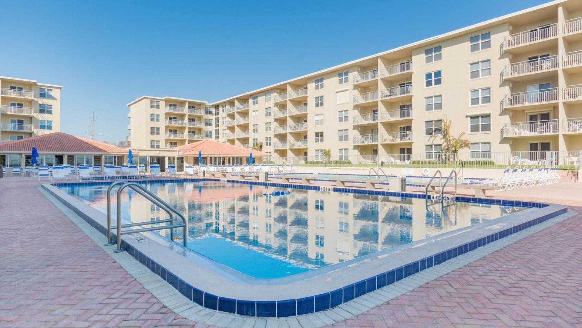 Top Floor Ocean and Pool Views located on No-Drive Beach with 2 Complex Pools