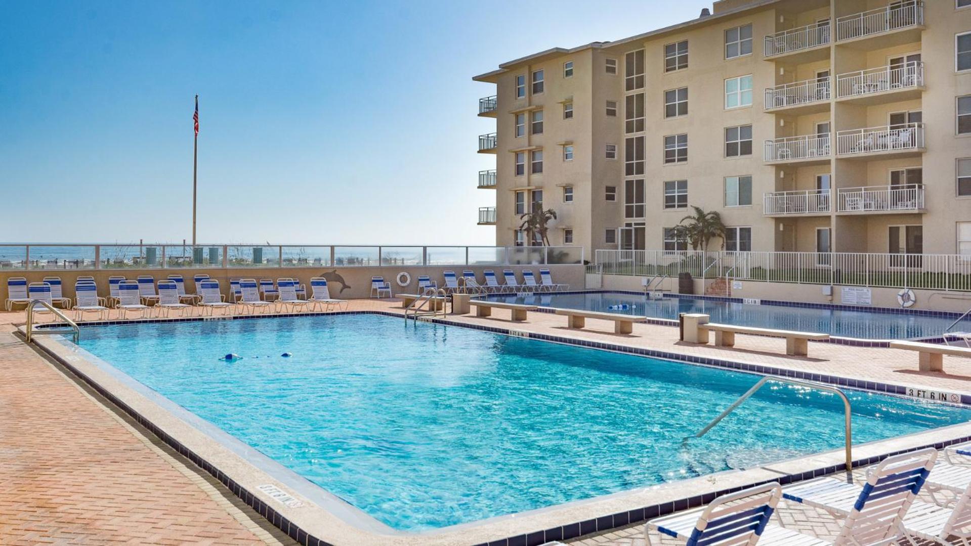 Direct Beach Access and 2 Pools located on the No-Drive Beach