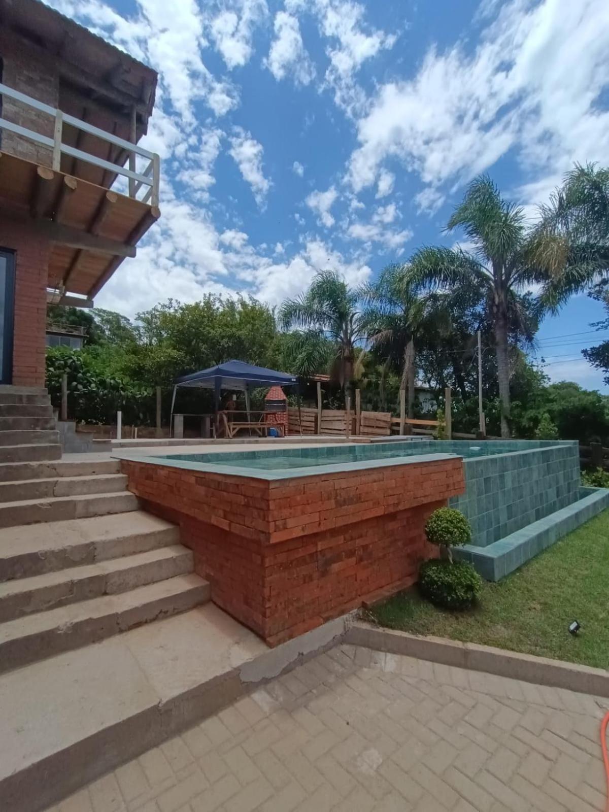 Casa com piscina em Torres