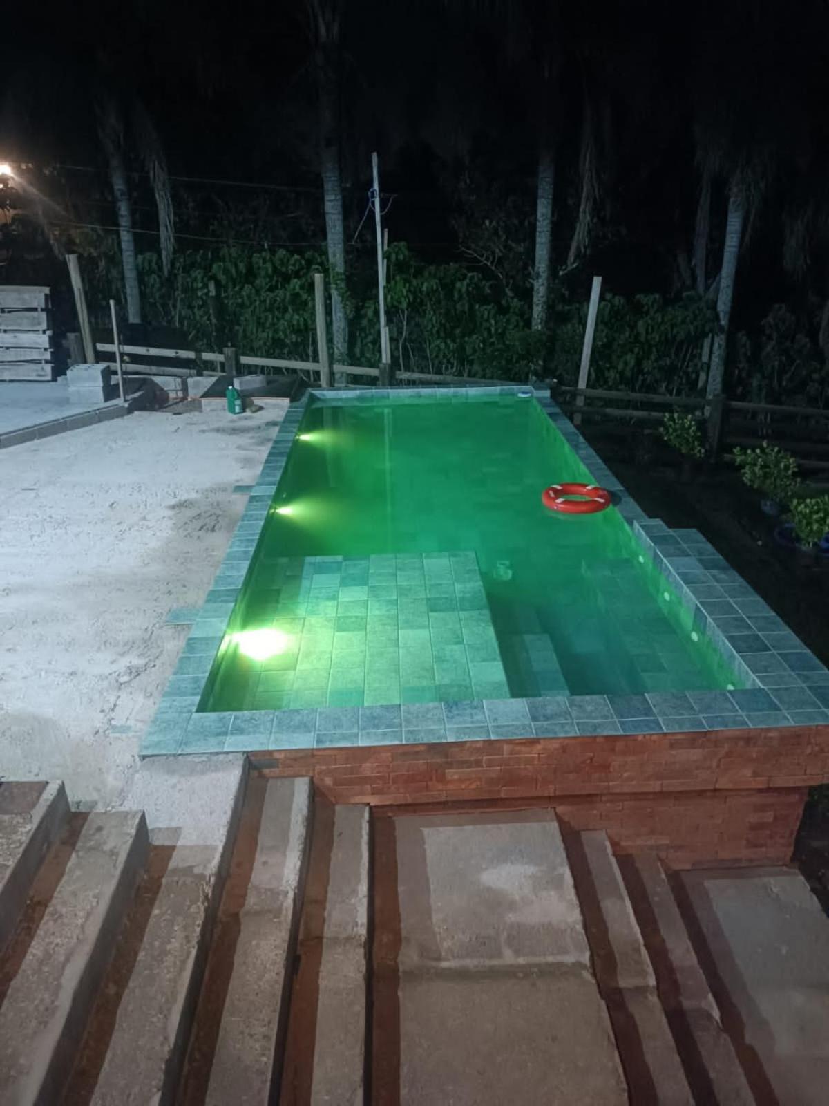 Casa com piscina em Torres