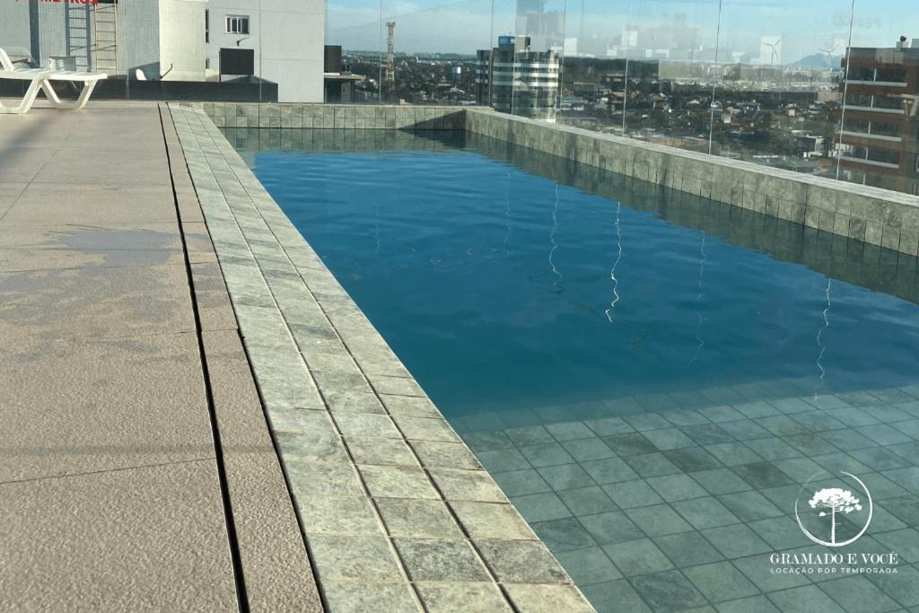 Apt Novo próximo ao mar com piscina