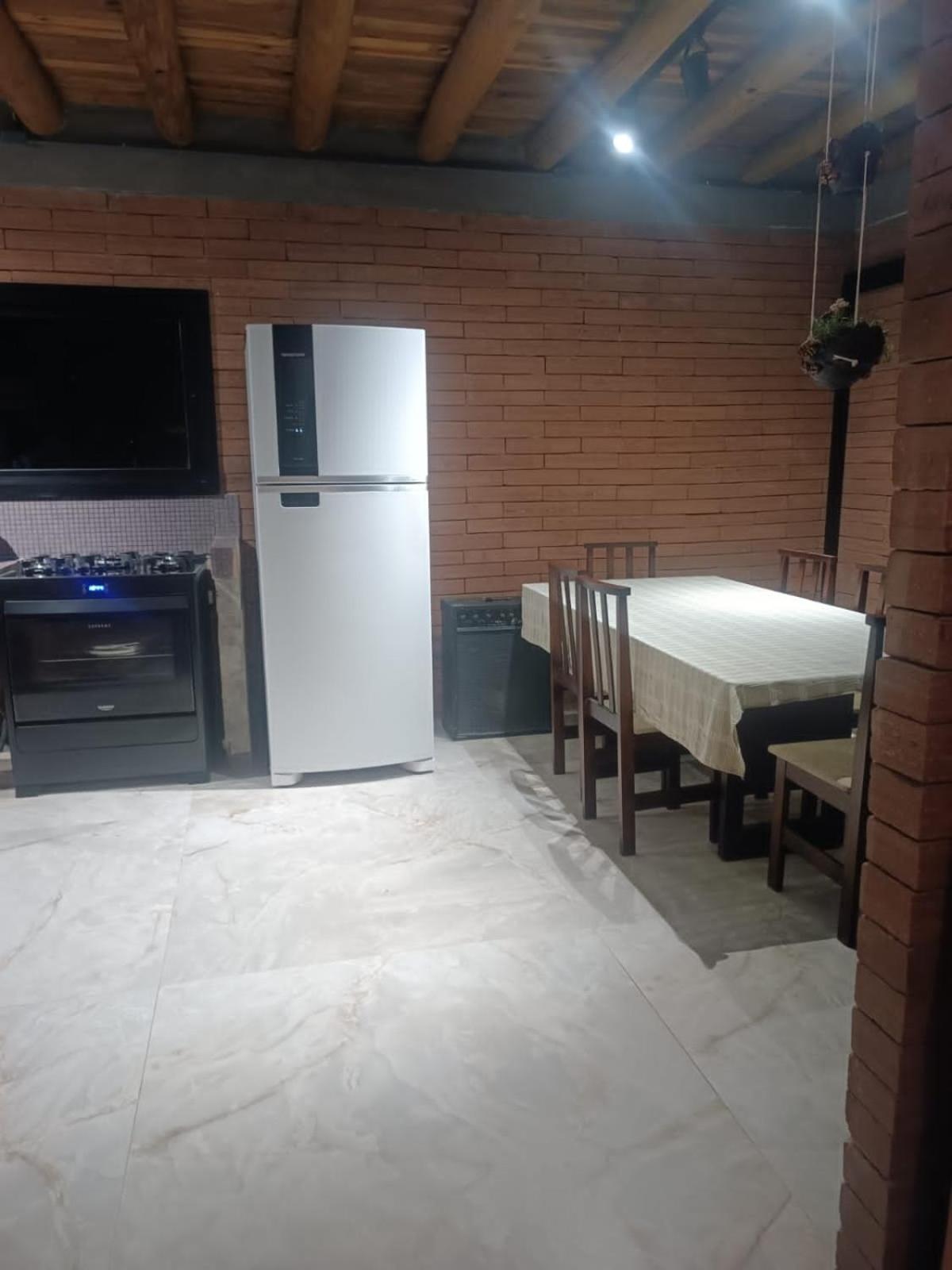 Casa com piscina em Torres