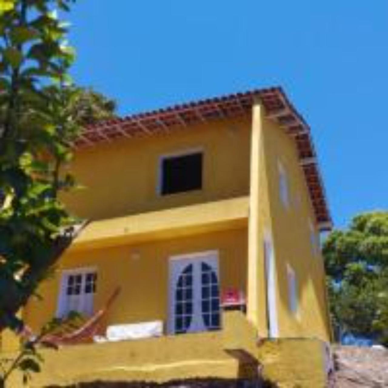 EncantoBúzios: Casa Amarela para Festas Inesquecíveis. Experiência Única nas Festas de Fim de Ano!